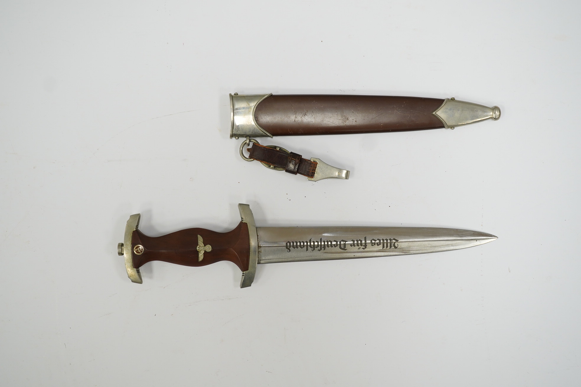 A WWII German S.A. dagger by Kuno Ritter, Solingen. Condition - fair to good